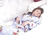 Girl Pulls Her Pajamas Down And Masturbates 